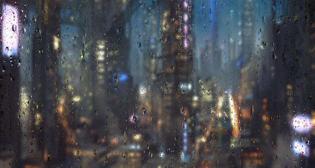 雨夜窗玻璃上水珠与城市灯光的插画